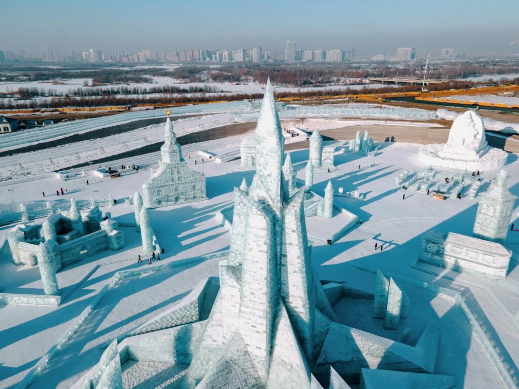 Stunning aerial view of ice sculptures at Harbin Ice Festival, China during winter.